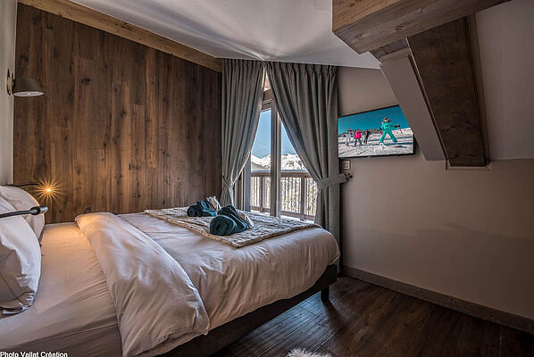 Surélévation et réhabilitation d'un immeuble de logements à Courchevel