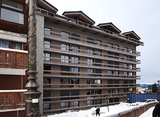 Surélévation et réhabilitation d'un immeuble de logements à Courchevel